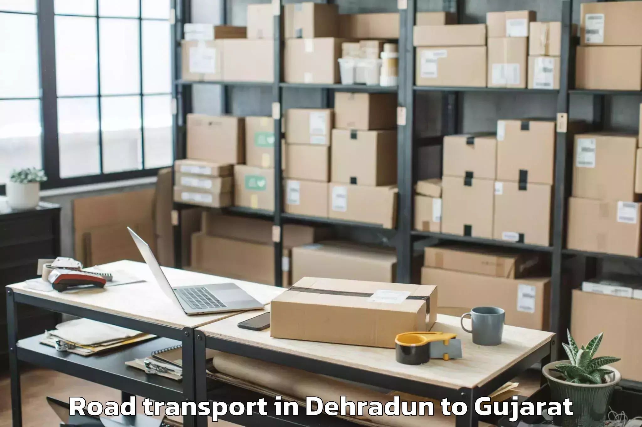 Affordable Dehradun to Manavadar Road Transport